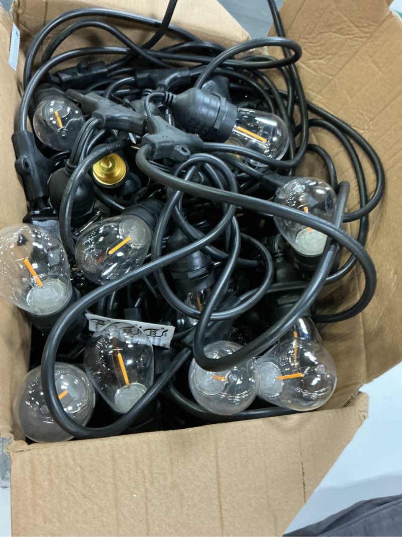 Condition photo showing As Is for harbor breeze 96-ft plug-in black indoor/outdoor string light with 48 white -light led edison bulbs