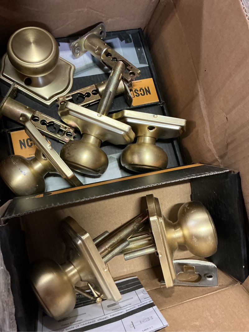 Condition photo showing As Is for 6 pack gold door knobs with camelot trim,interior door knob with lock,coastal door knob for hall & closet, satin brass 6 passage satin brass