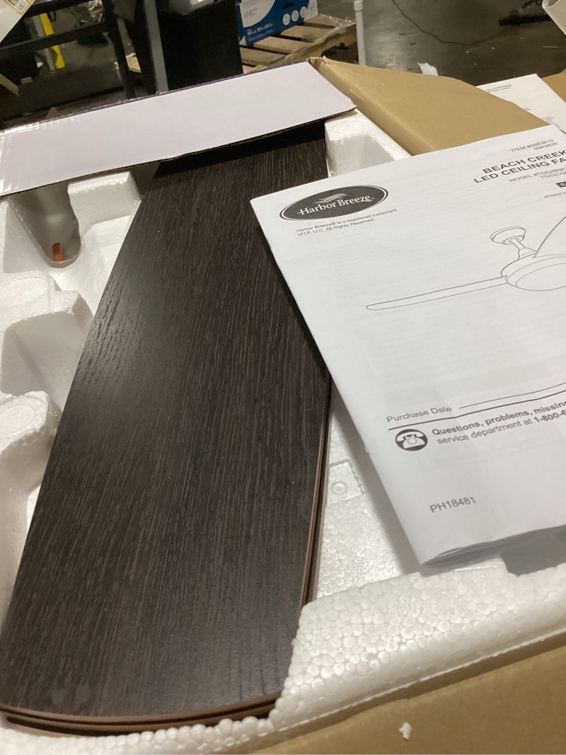 Condition photo showing As Is for harbor breeze beach creek 52-in bronze with sable/auburn blades integrated led indoor downrod or flush mount ceiling fan with light and remote (3-blade)
