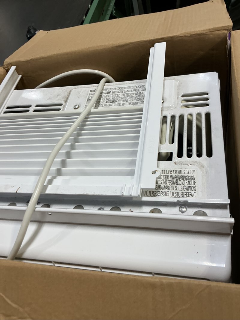 Condition photo showing As Is for amazon basics 5000-btu small window air conditioner, up to 150 sqf, window ac units with cool and fan functions, washable filter, adjustable window kit, intuitive mechanical controls, white white 5000 btu