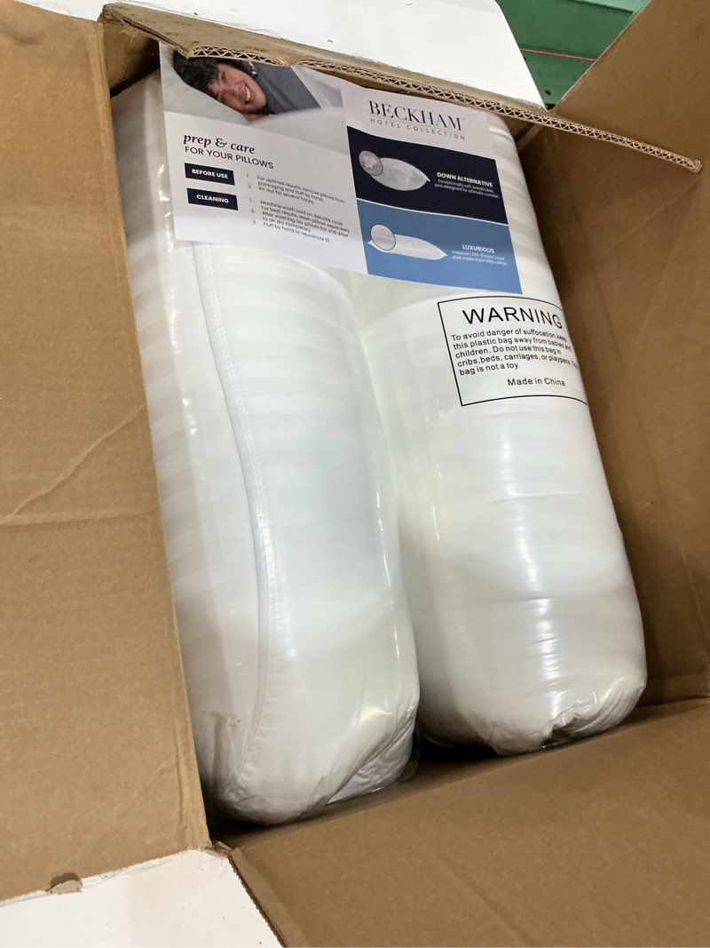 Condition photo showing New/Like New for set of 2 pillows 