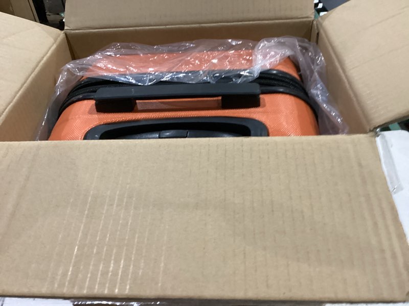 Condition photo showing Good Condition for Amazon Basics 21" Hardside Carry-On Luggage, Hardshell Suitcase With Wheels, Expandable For Up to 25% More Space, With Scratch-Resistant Surface, Four Multi-directional Wheels, Orange Orange Carry-On