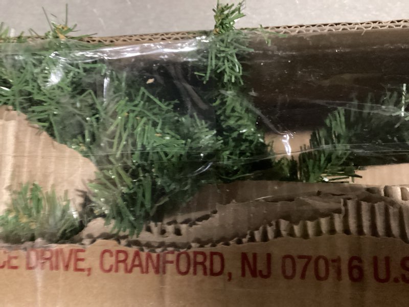 Condition photo showing As Is for National Tree Company 4 ft Unlit Kincaid Spruce Mini Artificial Christmas Tree, 269 Tips, Includes Stand, Green 4ft