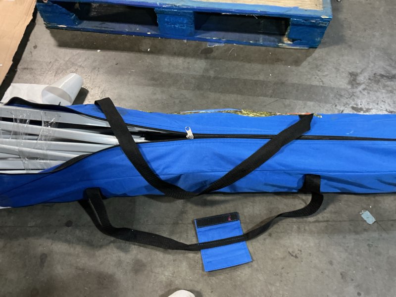 Condition photo showing As Is for ozark trail 10' x 10' instant slant leg pop-up outdoor canopy, blue