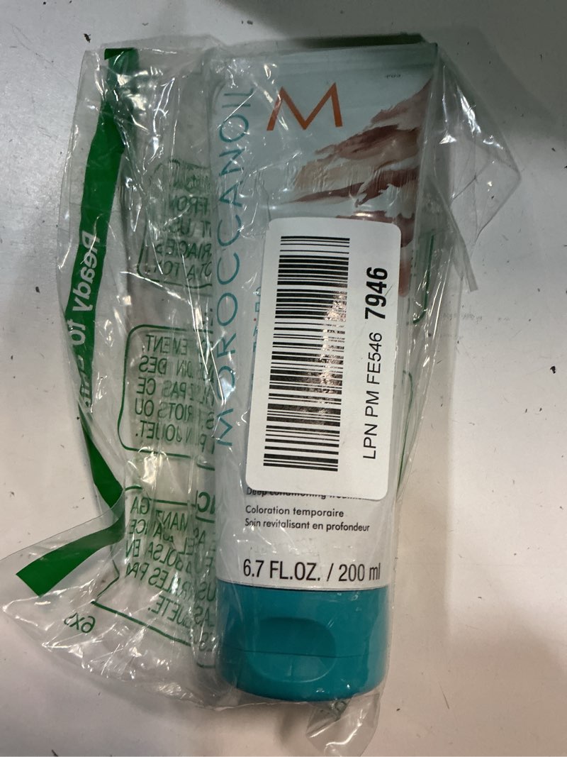 Condition photo showing New/Like New for (( unkown expiration date))moroccanoil color depositing mask, 6.7 fl. oz rose gold