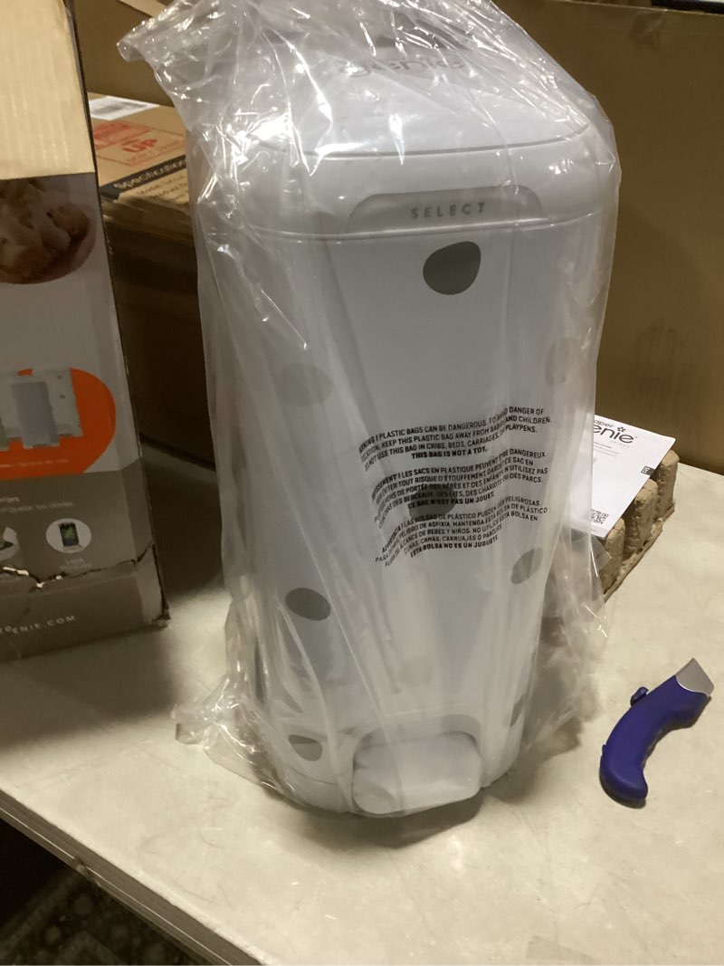 Condition photo showing Good Condition for Diaper Genie Select Pail (Polka Dot) is Made of Durable Stainless Steel and Includes 1 Starter Square Refill That can Hold up to 165 Newborn-Sized Diapers. Multicolored