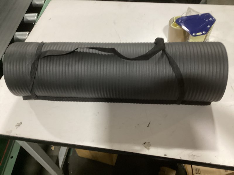 Condition photo showing Good Condition for Amazon Basics Extra Thick Exercise Yoga Mat with Carrying Strap Black 1/2 Inch