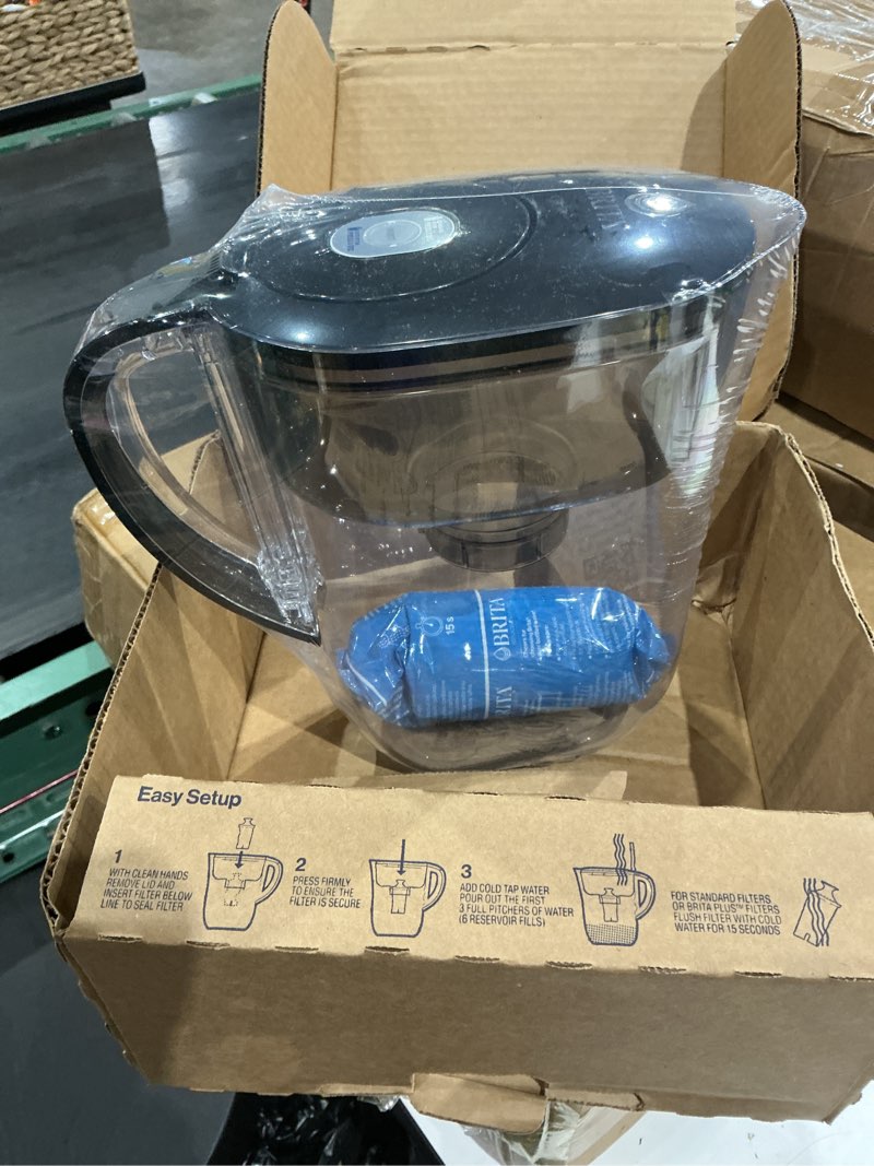 Condition photo showing New/Like New for brita small 6 cup water filter pitcher, 1 britaplus filter, metro, black (package may vary) plus black