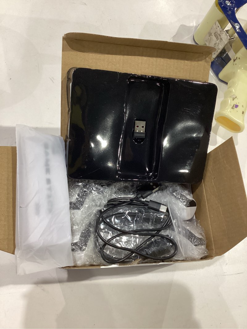 Condition photo showing As Is for 2026 upgraded retro gaming console with 20k+ classic games & 23 emulators, 4k hdmi plug & play game stick for tv, includes dual 2.4g wireless controllers & skin stickers (64gb)