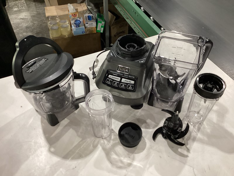 Condition photo showing As Is for *not tested*ninja kitchen system | 8-cup food processor bowl & 72 oz. blender all-in-one | with (2) 16 oz. to-go cups | for smoothies, ice crushing, dough & more | 1500 watt | black | bl770 pitcher + bowl + (2) 16-oz. cups… broken pieces, missing pieces