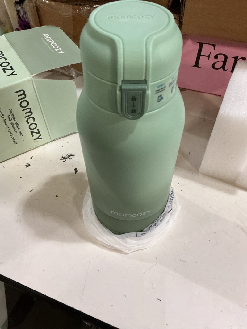Condition photo showing New/Like New for momcozy portable bottle warmer for travel – dual heating modes for breast milk & water, portable milk warmer with fast heating & long battery life, 17 ounces large capacity to meet your all-day needs gradual change of green