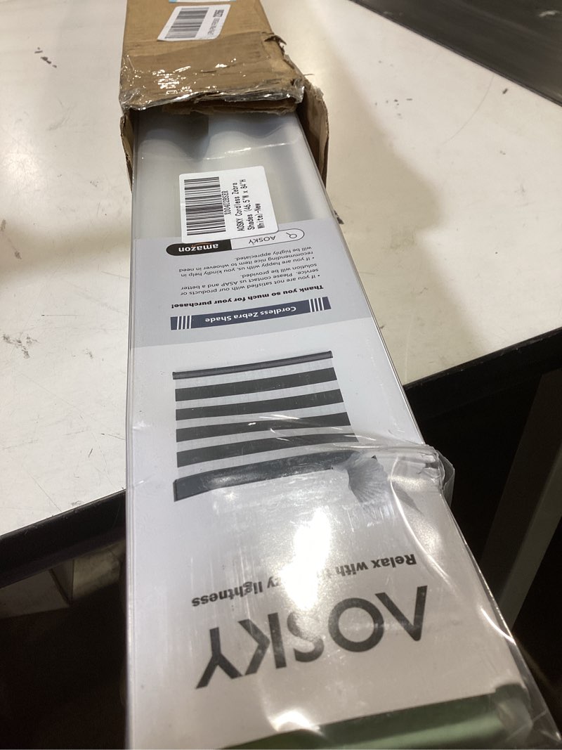 Condition photo showing Good Condition for aosky cordless zebra blinds for windows pull down roller window shades dual layer light filtering privacy for day and night, free-stop door shades for home easy to install (46.5" w x 84" h?white) 46.5"w x 84"h white