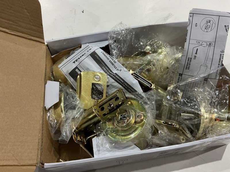 Condition photo showing As Is for hyper tough keyed entry tulip style doorknob and deadbolt double combo pack polished brass finish