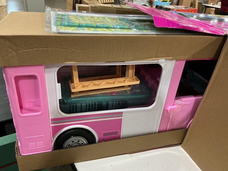 Condition photo showing New/Like New for barbie camper, doll playset with 50 accessories, transforms into truck, boat & house, includes pool, 3-in-1 dream camper (amazon exclusive)