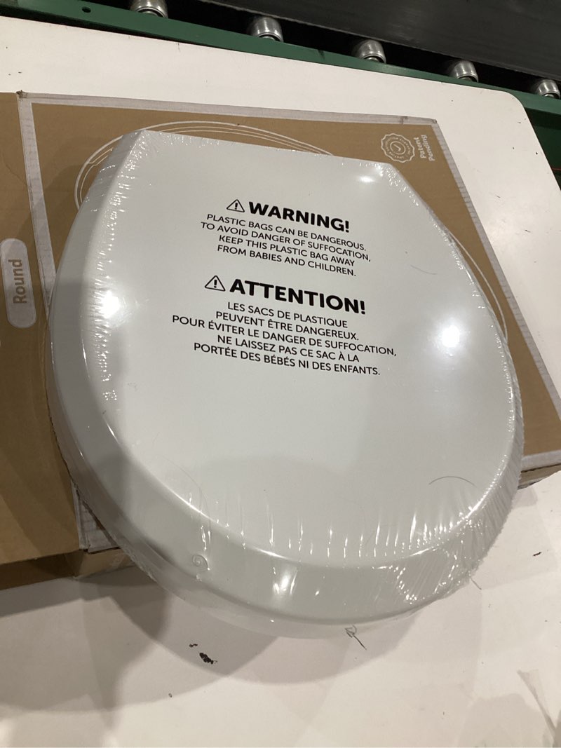 Condition photo showing New/Like New for jool baby quick flip toilet seat with built-in potty & splash guard for toddler training, slow close (elongated) oblong