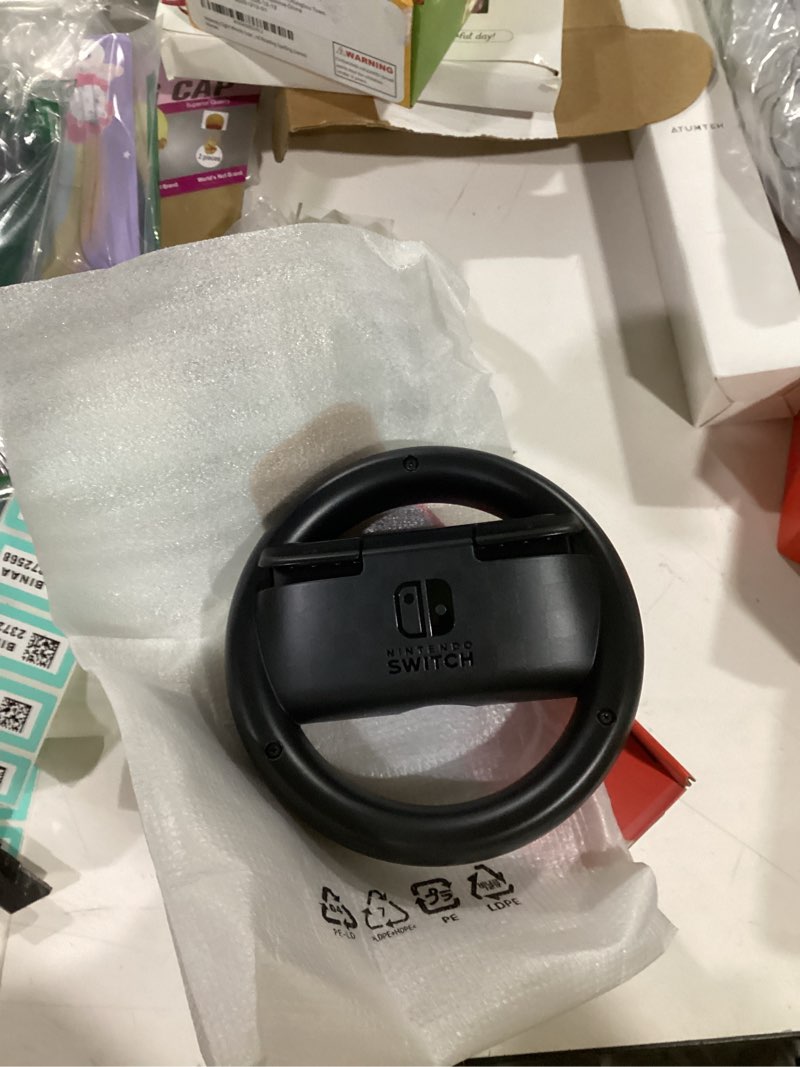 Condition photo showing New/Like New for nintendo switch joy-con wheel accessory pair standard