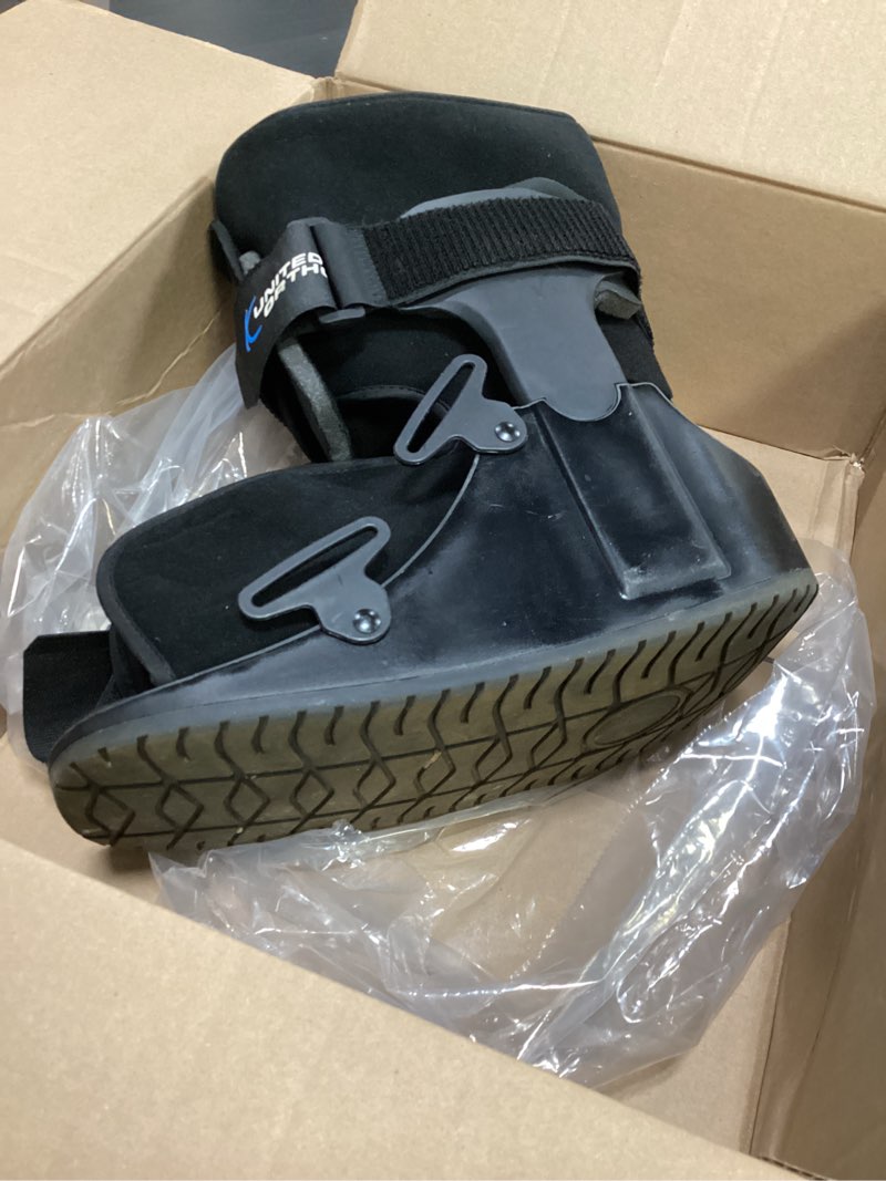 Condition photo showing As Is for united ortho short air cam walker fracture boot, large, black black large boot