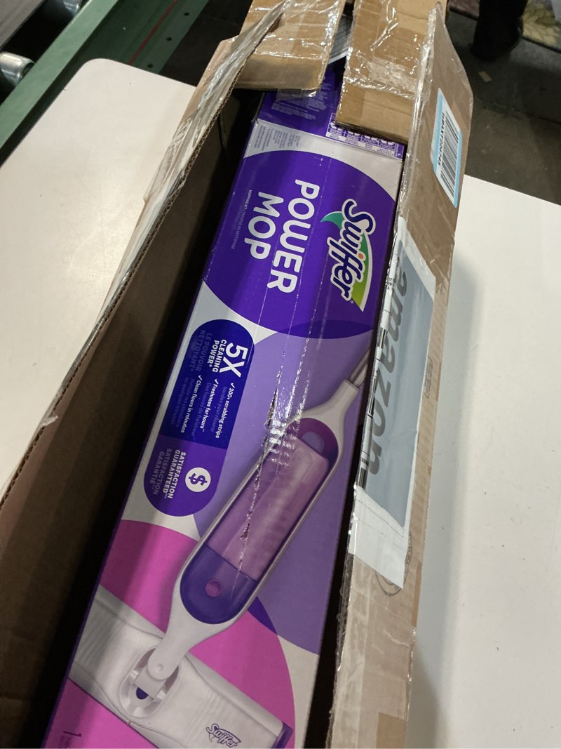 Condition photo showing item condition for Swiffer PowerMop Multi-Surface Mop Kit for Floor Cleaning, Includes PowerMop, 2 Mopping Pad Refills, 1 Cleaning Solution with Fresh Scent and 2 Batteries Purple and White