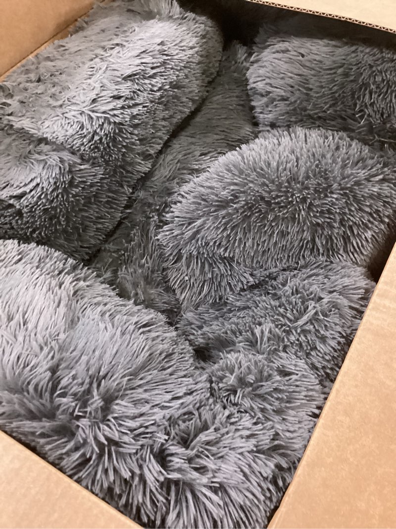 Condition photo showing Good Condition for FurHaven 45" Calming Donut Dog Bed for Large Dogs, Round Plush Donut Design with Soft Filling for Snuggling Comfort, Removable Washable Cover, Jumbo XL, Shaggy Faux Fur, Gray Jumbo Gray
