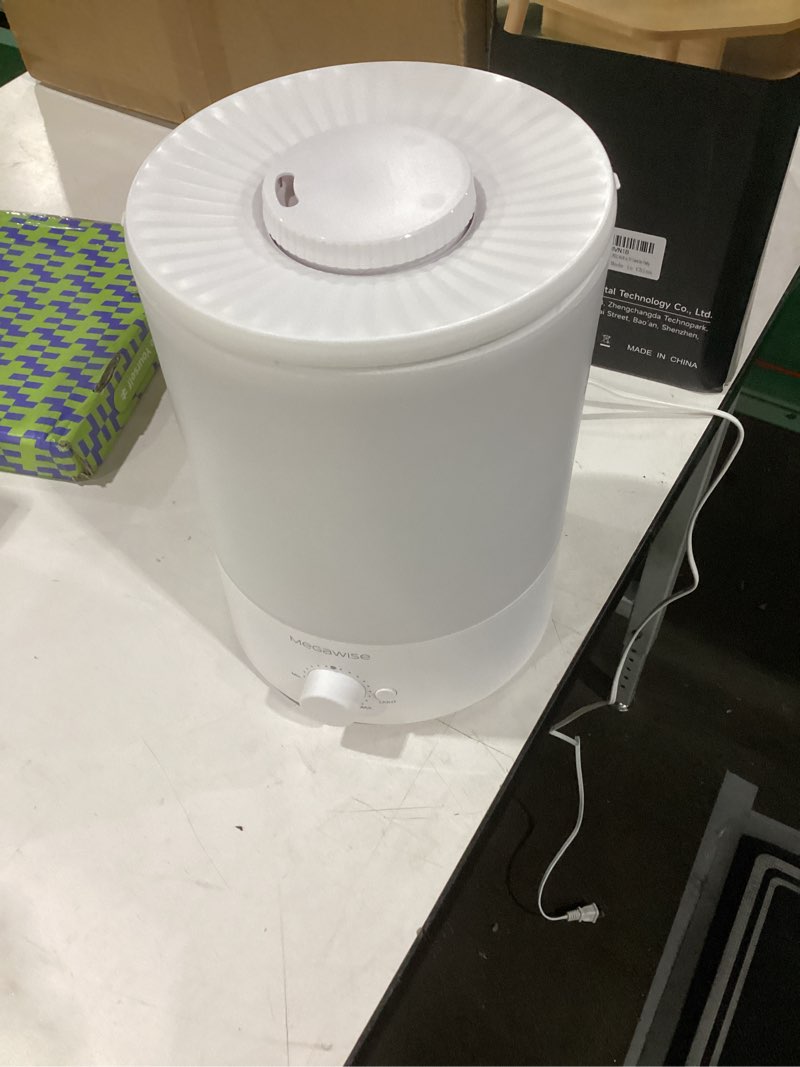 Condition photo showing As Is for megawise topfill 7-colour night light humidifier for kid bedroom with 3.5l large capacity, no leakage design fine mist output auto shutoff, essential oil safe tank 3.5 liters