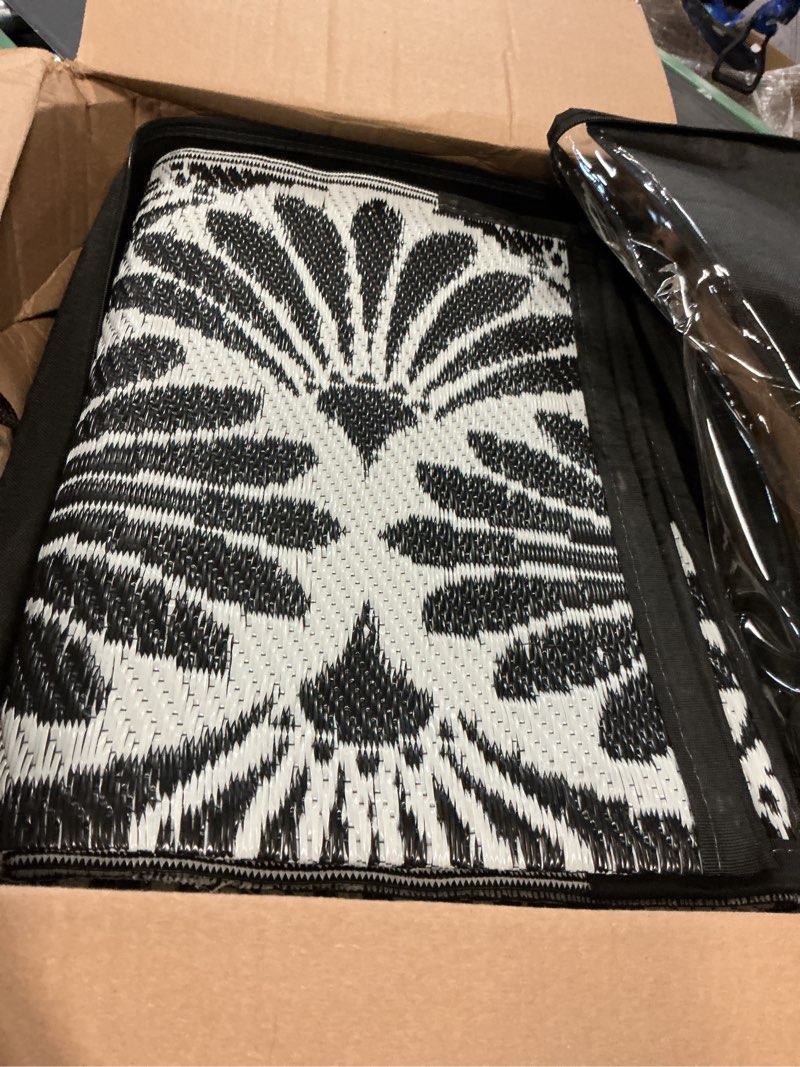 Condition photo showing Good Condition for lahome outdoor patio rugs 8x10 waterproof, boho outdoor plastic straw rug | stain resistant mats for backyard garden deck porch camping outside, black white,8'x10'