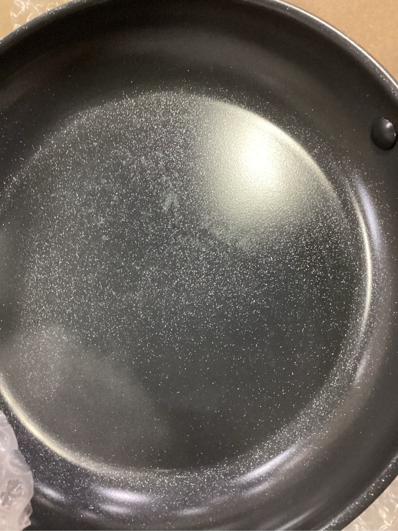 Condition photo showing As Is for oxo enhanced 10" frying pan skillet, pfas-free ceramic nonstick, durable hard anodized cookware, scratch resistant, stainless steel handle, good grips, dishwasher safe, oven safe, black black 10" frying pan skillet