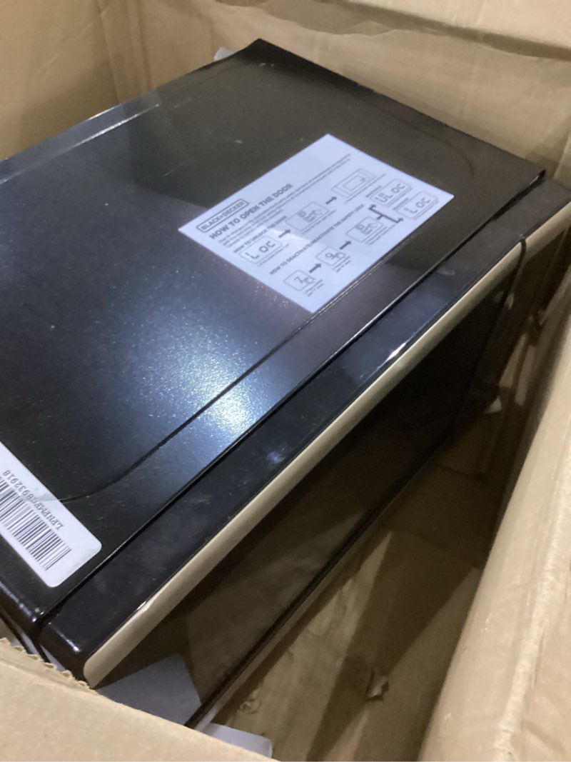 Condition photo showing As Is for BLACK+DECKER EM720CB7 Digital Microwave Oven with Turntable Push-Button Door, Child Safety Lock, 700W, Stainless Steel, 0.7 Cu.ft
