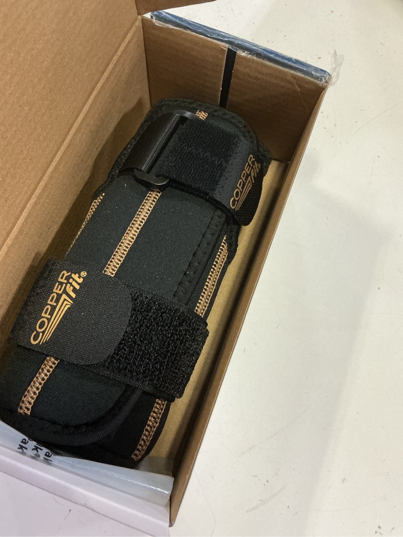 Condition photo showing Good Condition for rapid relief one size fits most wrist brace in black