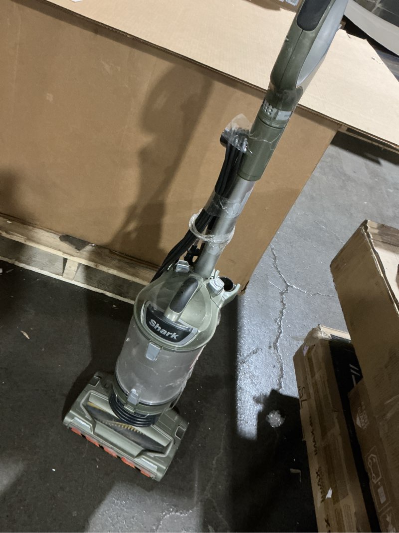 Condition photo showing As Is for (powers on) shark duoclean vacuum