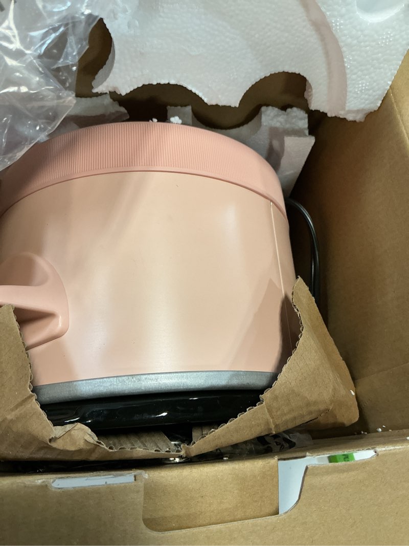 Condition photo showing As Is for bella 1.5 qt slow cooker with 3 heat manual control, ceramic nonstick coating, dishwasher safe stoneware pot and tempered glass lid, tangle free cord wrap & cool touch handles, blossom