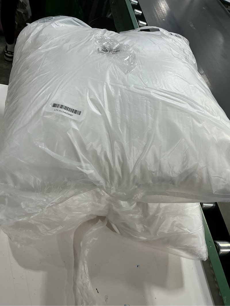 Condition photo showing As Is for Pack of 2 24x24 Outdoor Pillow Inserts, Water Resistant Throw Pillow Inserts, Cushion Inner Pads for Patio, Furniture, Sofa, Bed, Living Room, Garden Decorative Waterproof Pillow Inserts White ?2 Pack? 24x24 inch