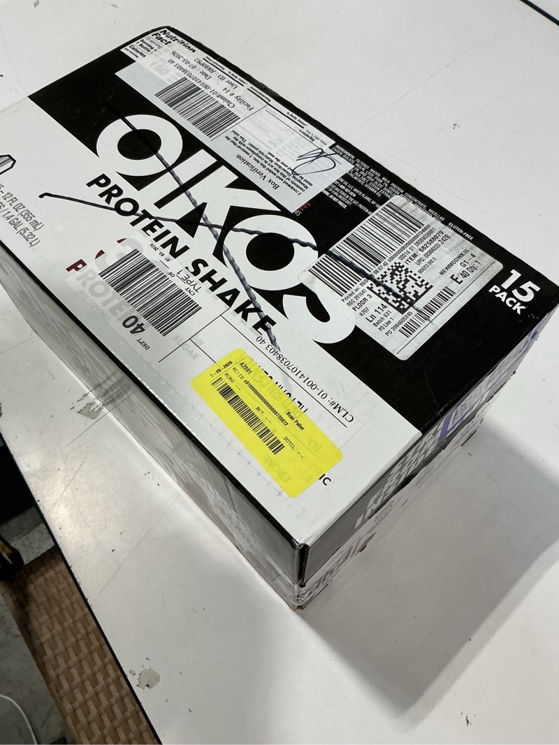 Condition photo showing New/Like New for oikos protein shake chocolate 30g protein shelf stable 12 fl oz bottle 15 count