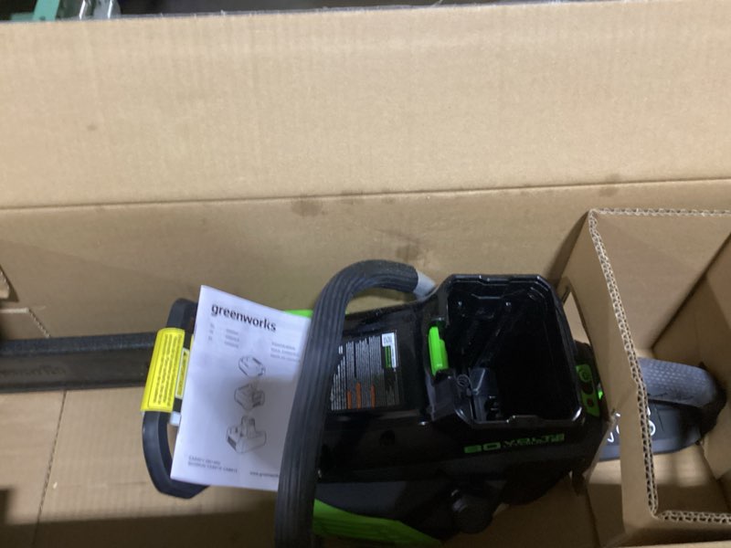 Condition photo showing As Is for greenworks 80v 18" brushless cordless chainsaw (great for tree felling, limbing, pruning, and firewood) / 75+ compatible tools), 2.0ah battery and rapid charger included 18" (2.0ah) 1.8kw motor