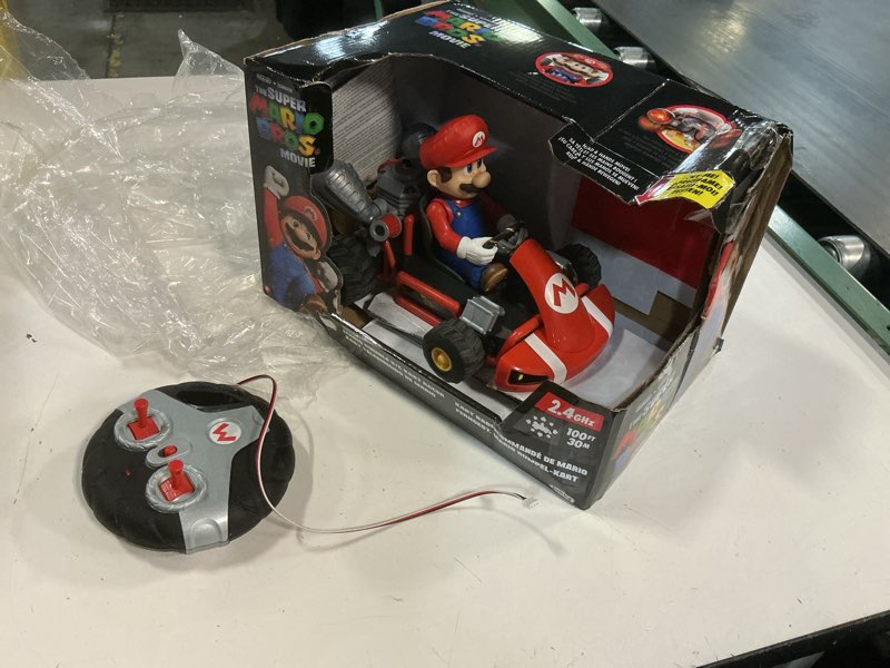 Condition photo showing As Is for super mario bros. movie rumble kart rc racer – 2.4ghz full-function remote control car – lights, sounds, spinning action – 100ft range – ages 4+