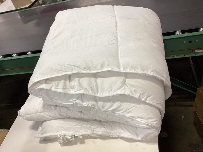 Condition photo showing As Is for Amazon Basics White Down Alternative Comforter and Duvet Insert with Corner Tabs (King, All-Season) King All-Season