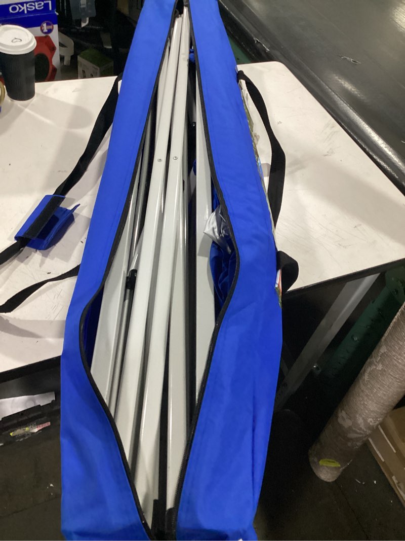 Condition photo showing As Is for ozark trail 10' x 10' instant slant leg pop-up canopy tent, blue
