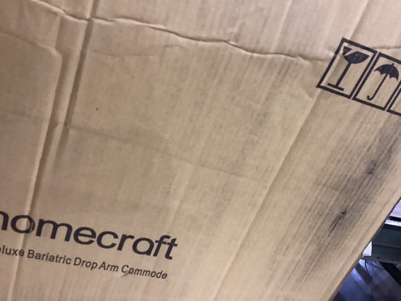 Condition photo showing As Is for Drop arm commode