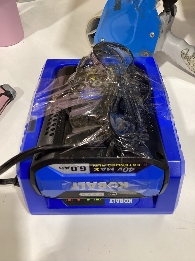 Condition photo showing Good Condition for kobalt 40v max 6.0 ah extended run battery seated in a compatible kobalt charger