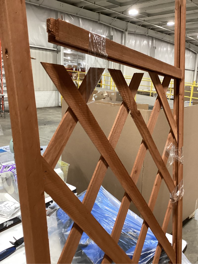 Condition photo showing As Is for style selections 24.02-in w x 72.05-in h brown wood garden trellis