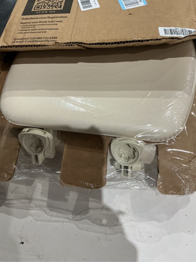 Condition photo showing Good Condition for mayfair padded toilet seat, cushioned soft vinyl over wood core seat, secure hinges, easy clean, made in usa, elongated, bone round bone toilet seat