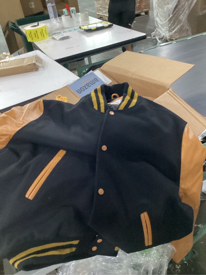 Condition photo showing Good Condition for varsity base letterman jacket (black wool, old gold leather, x large