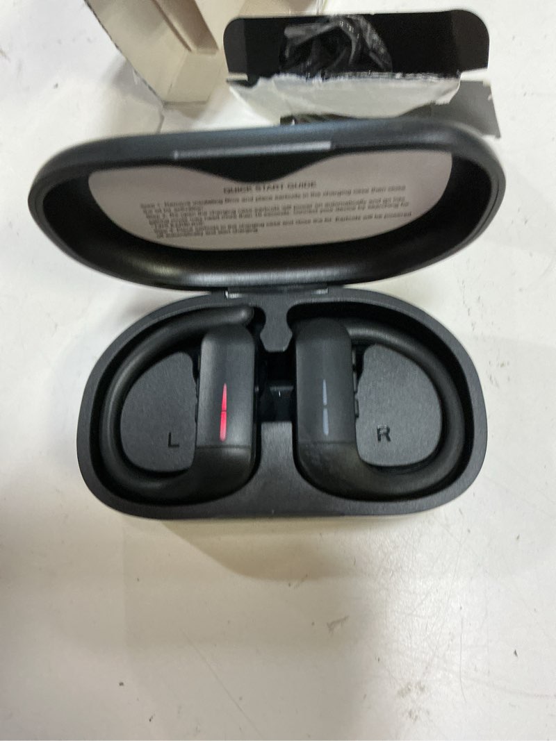 Condition photo showing Good Condition for wireless sport earphones with black charging case