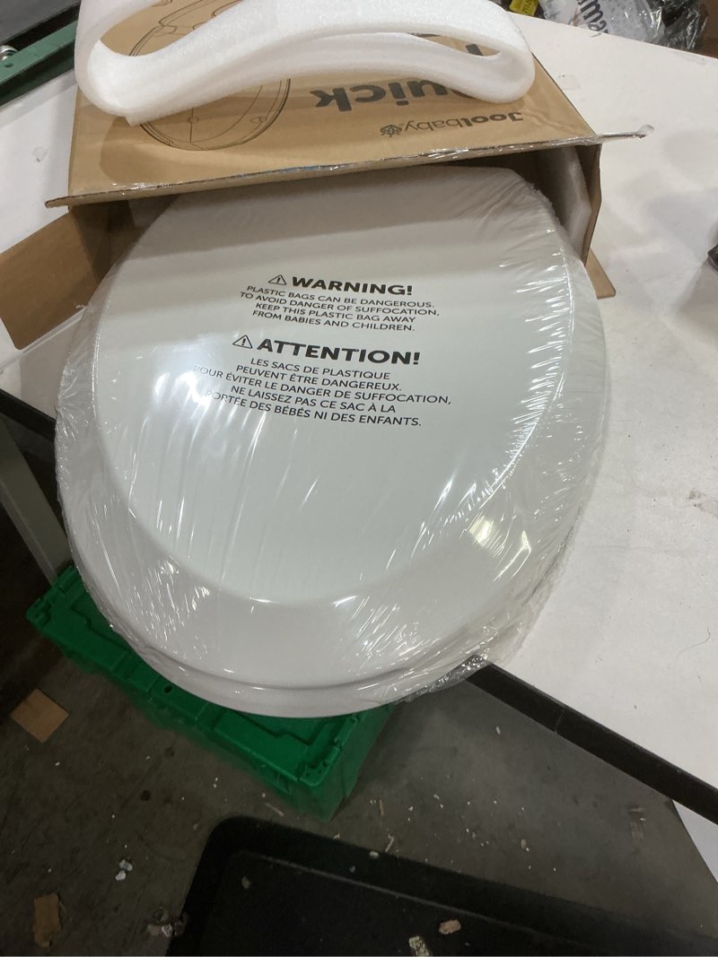 Condition photo showing New/Like New for quick flip toilet seat with built-in potty & splash guard for toddler training, slow close - jool baby (elongated)