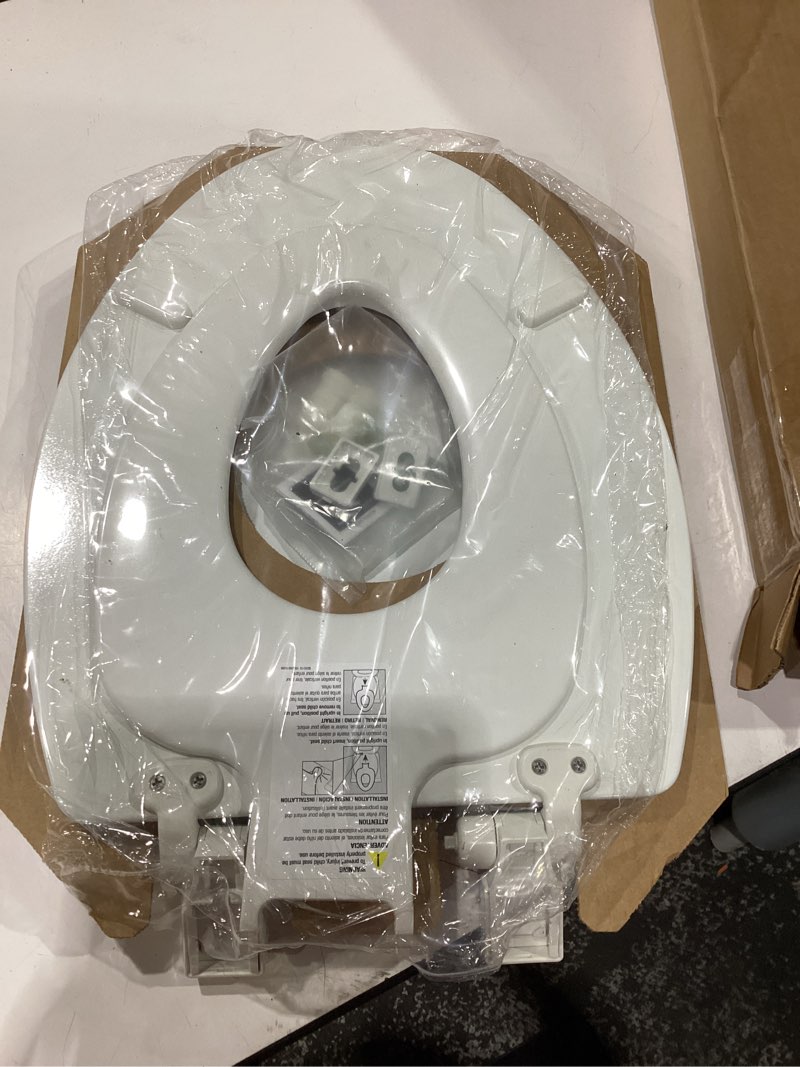 Condition photo showing Good Condition for mayfair nextstep2 toilet seat with built-in potty training seat, slow-close, removable that will never loosen, elongated, white elongated 1