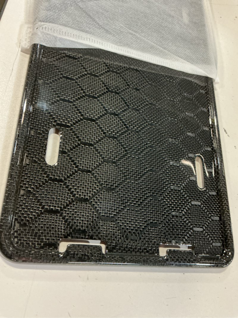 Condition photo showing Good Condition for 100% carbon fiber license plate frame, all-carbon fiber snap-on 2/4-hole license plate frame, unobstructed view, comes with screw covers and shock-absorbing pads (soccer pattern) carbon fiber (soccer pattern)