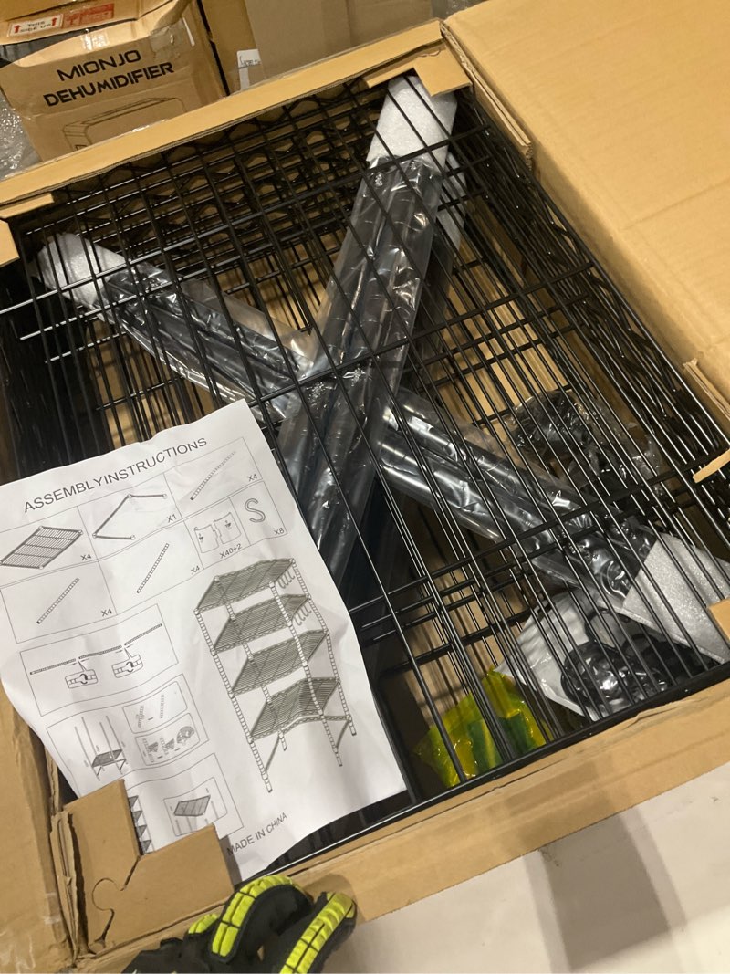 Condition photo showing Good Condition for 4 tier black metal wire storage rack