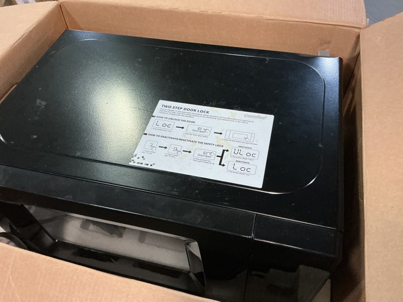 Condition photo showing Good Condition for COMFEE' EM720CPL-PMB Countertop Microwave Oven with Sound On/Off, ECO Mode and Easy One-Touch Buttons, 0.7cu.ft, 700W, Black