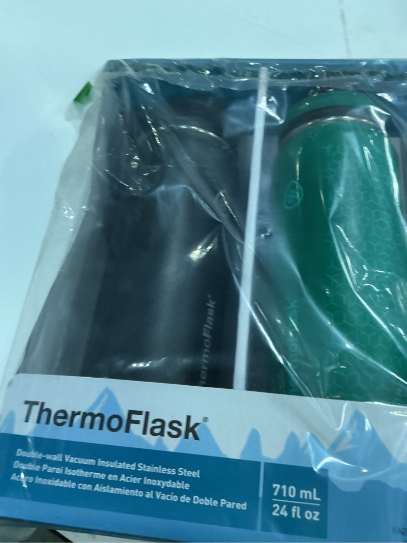 Condition photo showing Good Condition for thermoflask stainless steel water bottles 2-pack - double-wall vacuum insulated 24 oz bpa-free spout lids - keeps drinks cold 24 hrs, hot 12 hrs - leakproof, dishwasher safe, black/malachite 24 ounces black / malachite 2