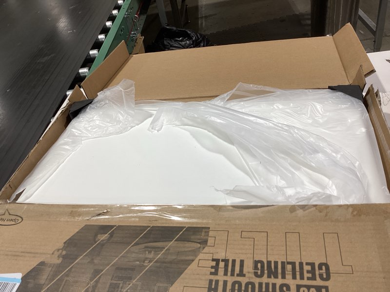 Condition photo showing As Is for Art3d 24"x24" Smooth Drop Ceiling Tiles (48 Sq.Ft), 12-Pack 2ft x 2ft PVC Tiles for Home and Office, Waterproof and Reusable Plastic Ceiling, White White 24" x 24" 12Pcs