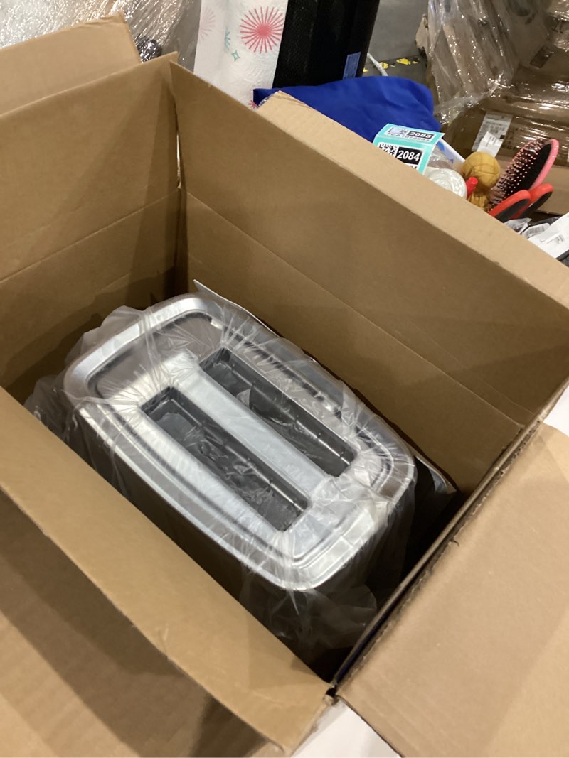 Condition photo showing Good Condition for GE 2 Slice Stainless Steel Toaster, Extra Wide Slots for Toasting Bagels, Breads, Waffles & More, 7 Adjustable Shade Settings, Removable Crumb Tray, Countertop Kitchen Essentials, 850 Watts 2-Slice Stainless Steel